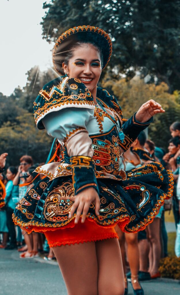 woman in red and gold traditional dress